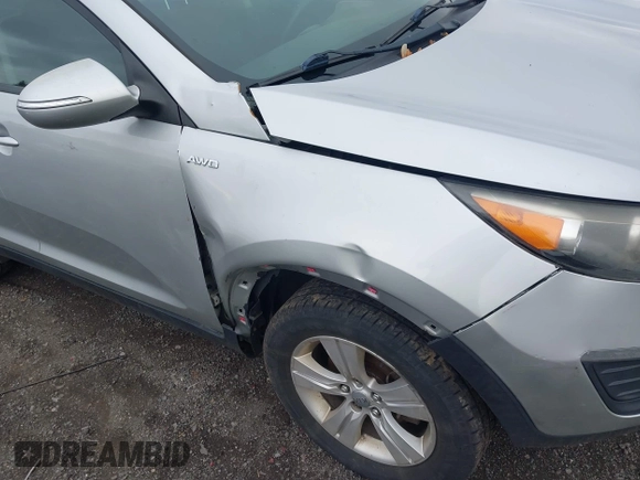 2012 Kia Sportage LX with VIN KNDPBCA25C7280598, listed as a IAAI auction lot 42223042 with 147,507 mi miles and . Bid and sale history available at DreamBid. Image 6.