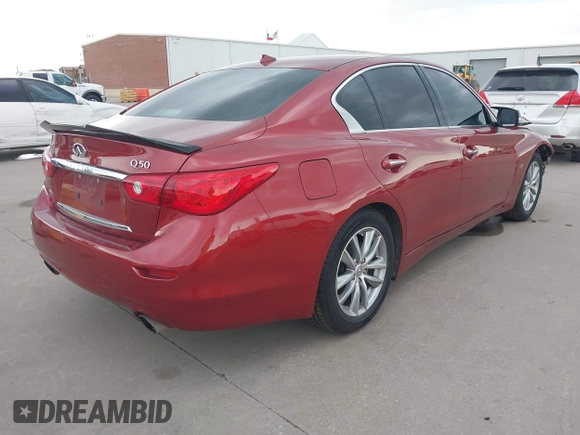 2014 Infiniti Q50 Premium z VIN JN1BV7AP8EM673359, wystawiony jako IAAI lot #42300427 z przebiegiem 118 779 mil mil oraz . Historia ofert i sprzedaży dostępna na DreamBid. Obrazek 4.