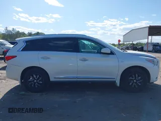 2015 Infiniti QX60 with VIN 5N1AL0MM1FC524964, listed as a IAAI auction lot 42010993 with 144,670 mi miles and . Bid and sale history available at DreamBid. Image 13.