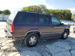 1997 GMC Yukon with VIN 1GKEK13R7VJ711782, listed as a Copart auction lot 74793184 with 208,718 mi miles and Salvage Title. Bid and sale history available at carsss.com. Image 3.
