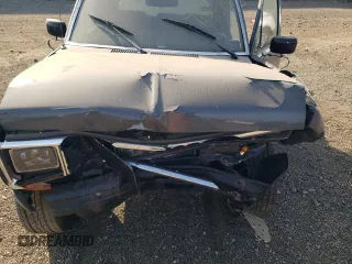1988 Ford Ranger with VIN 1FTCR15T7JPA44324, listed as a Copart auction lot 71893864 with 288,650 mi miles and Salvage Title. Bid and sale history available at carsss.com. Image 12.