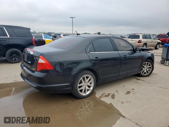 2012 Ford Fusion SEL z VIN 3FAHP0JGXCR426220, wystawiony jako Copart lot #59346985 z przebiegiem 151 397 mil mil oraz Szkoda całkowita • Salvage title. Historia ofert i sprzedaży dostępna na DreamBid. Obrazek 3.