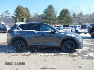 2022 Mazda CX-5 2.5 Turbo with VIN JM3KFBAY1N0526661, listed as a IAAI auction lot 41350659 with 22,963 mi miles and . Bid and sale history available at carsss.com. Image 13.