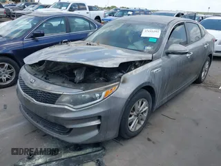 2016 Kia Optima LX with VIN 5XXGT4L32GG073267, listed as a IAAI auction lot 37153293 with 193,858 mi miles. Bid and sale history available at carsss.com. Image 2.