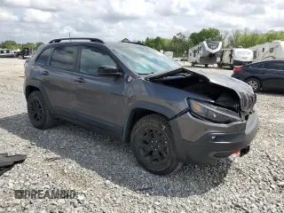 2022 Jeep Cherokee Trailhawk with VIN 1C4PJMBX1ND510760, listed as a Copart auction lot 51996585 with 17,748 mi miles and Salvage title. Bid and sale history available at DreamBid. Image 4.