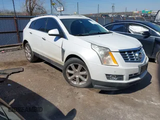 2014 Cadillac SRX Performance Collection with VIN 3GYFNCE36ES527809, listed as a IAAI auction lot 41790776 with 166,302 mi miles. Bid and sale history available at carsss.com. Image 1.