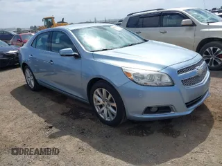 2013 Chevrolet Malibu LTZ with VIN 1G11H5SA7DU134124, listed as a IAAI auction lot 42052592 with 124,031 mi miles and . Bid and sale history available at DreamBid. Image 1.
