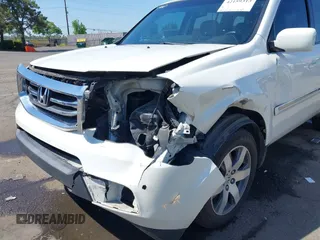 2013 Honda Pilot Touring with VIN 5FNYF4H92DB031589, listed as a IAAI auction lot 42159313 with 192,604 mi miles and . Bid and sale history available at carsss.com. Image 6.