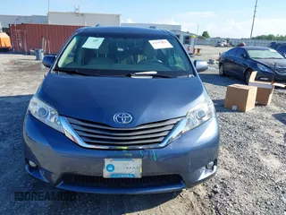 2014 Toyota Sienna XLE z VIN 5TDYK3DC9ES526117, wystawiony jako IAAI lot #42247546 z przebiegiem 119 096 mil mil oraz . Historia ofert i sprzedaży dostępna na DreamBid. Obrazek 12.