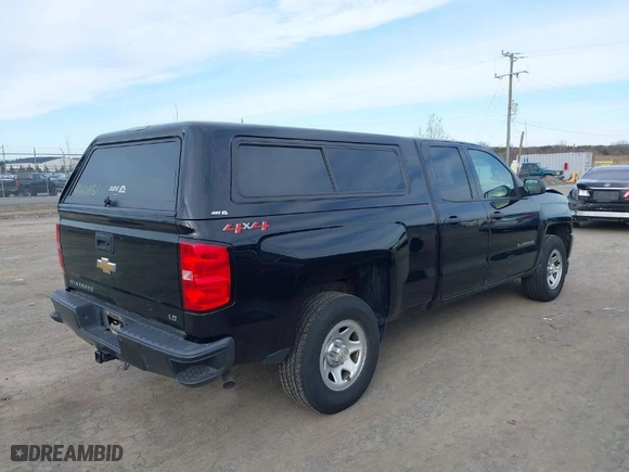 2019 Chevrolet Silverado 1500 LD Work Truck with VIN 2GCVKNEC5K1136275, listed as a IAAI auction lot 41601151 with 175,895 mi miles. Bid and sale history available at carsss.com. Image 4.