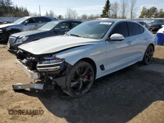 2023 Genesis G70 3.3T z VIN KMTG54TE9PU110080, wystawiony jako Copart lot #48878795 z przebiegiem 37 955 mil mil oraz Szkody całkowita. Historia ofert i sprzedaży dostępna na DreamBid. Obrazek 1.