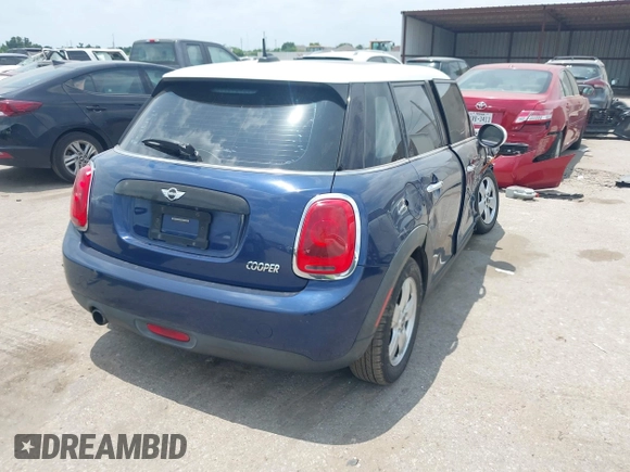 2017 MINI Hardtop 4 Door Cooper with VIN WMWXU1C59H2E18069, listed as a IAAI auction lot 42286035 with 85,835 mi miles and . Bid and sale history available at DreamBid. Image 4.