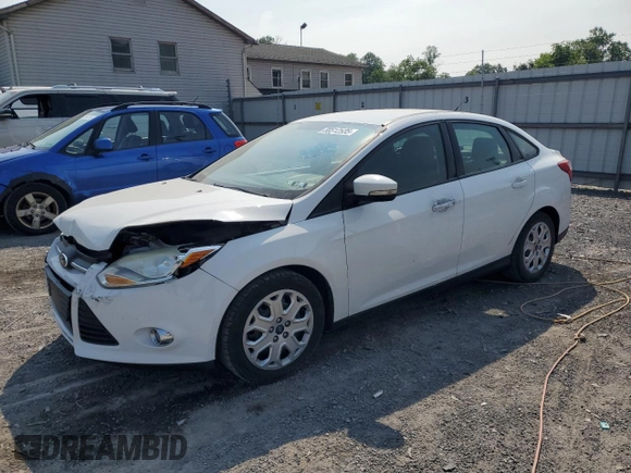 2012 Ford Focus SE with VIN 1FAHP3F21CL445400, listed as a Copart auction lot 58512535 with 142,515 mi miles and Salvage title. Bid and sale history available at DreamBid. Image 1.
