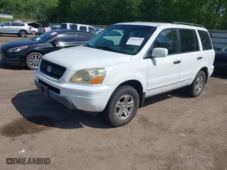 2003 Honda Pilot EX with VIN 2HKYF18593H613457, listed as a IAAI auction lot 42091759 with 297,397 mi miles. Bid and sale history available at carsss.com. Image 2.