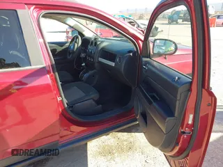 2014 Jeep Compass Sport with VIN 1C4NJCBA3ED812435, listed as a IAAI auction lot 41424374 with 174,663 mi miles and . Bid and sale history available at DreamBid. Image 5.