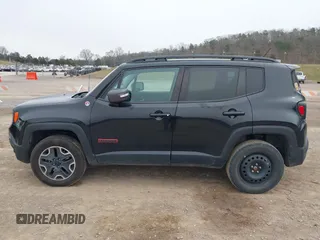2017 Jeep Renegade Trailhawk z VIN ZACCJBCB9HPG55038, wystawiony jako IAAI lot #41737043 z przebiegiem 103 488 mil mil oraz . Historia ofert i sprzedaży dostępna na DreamBid. Obrazek 15.