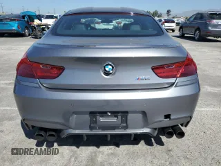 2015 BMW M6 z VIN WBS6C9C56FD467608, wystawiony jako Copart lot #67796074 z przebiegiem 67 706 mil mil oraz Szkoda całkowita • Salvage title. Historia ofert i sprzedaży dostępna na DreamBid. Obrazek 6.