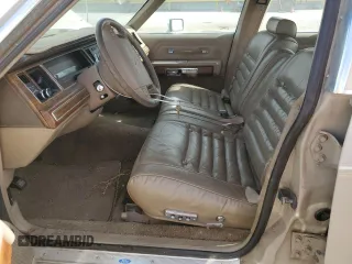 1991 Mercury Grand Marquis z VIN 2MECM75FXMX633893, wystawiony jako Copart lot #87439324 z przebiegiem 65 046 mil mil oraz Tytuł czysty. Historia ofert i sprzedaży dostępna na DreamBid. Obrazek 7.