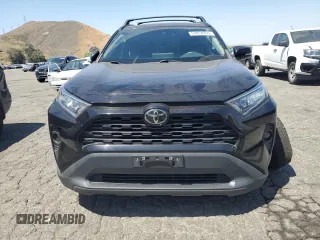 2021 Toyota RAV4 XLE with VIN 2T3P1RFV8MC167485, listed as a Copart auction lot 57814355 with 73,188 mi miles and Salvage title. Bid and sale history available at DreamBid. Image 5.