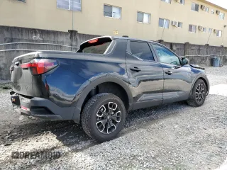 2023 Hyundai Santa Cruz SEL z VIN 5NTJB4AE4PH057705, wystawiony jako Copart lot #80667054 z przebiegiem 14 580 mil mil oraz Nie do naprawy • Non repairable. Historia ofert i sprzedaży dostępna na DreamBid. Obrazek 3.