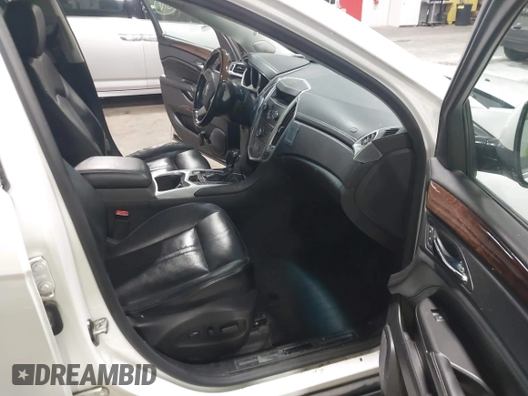 2012 Cadillac SRX Premium Collection with VIN 3GYFNFE39CS561614, listed as a IAAI auction lot 42529959 with 59,088 mi miles and . Bid and sale history available at DreamBid. Image 5.