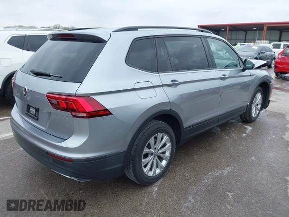 2019 Volkswagen Tiguan S with VIN 3VV1B7AX9KM110873, listed as a IAAI auction lot 42010931 with 82,745 mi miles and . Bid and sale history available at DreamBid. Image 4.