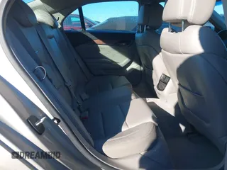 2014 Cadillac CTS Sedan RWD with VIN 1G6AP5SX8E0184038, listed as a IAAI auction lot 41235258 with 107,420 mi miles. Bid and sale history available at carsss.com. Image 8.