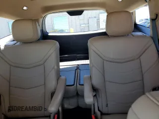 2024 Cadillac XT6 Premium Luxury z VIN 1GYKPERS1RZ755490, wystawiony jako Copart lot #49706575 z przebiegiem 4 239 mil mil oraz Szkoda całkowita • Salvage title. Historia ofert i sprzedaży dostępna na DreamBid. Obrazek 10.