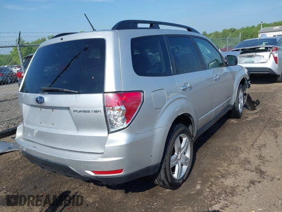2009 Subaru Forester X with VIN JF2SH63699H720644, listed as a IAAI auction lot 42163727 with 141,503 mi miles and . Bid and sale history available at DreamBid. Image 4.
