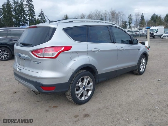 2015 Ford Escape Titanium with VIN 1FMCU9JX2FUB08134, listed as a IAAI auction lot 41839666 with 125,713 mi miles. Bid and sale history available at carsss.com. Image 4.