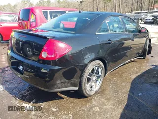 2005 Pontiac G6 GT with VIN 1G2ZH548154165427, listed as a IAAI auction lot 41650622 with 149,187 mi miles. Bid and sale history available at carsss.com. Image 4.