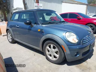 2010 MINI Hardtop with VIN WMWMF3C56ATZ24156, listed as a IAAI auction lot 41997887 with 149,308 mi miles and . Bid and sale history available at DreamBid. Image 1.
