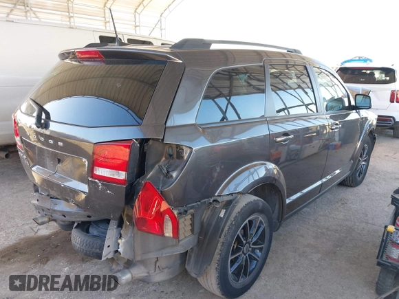 2018 Dodge Journey SXT with VIN 3C4PDCBG6JT505303, listed as a IAAI auction lot 41238544 with 80,370 mi miles and . Bid and sale history available at DreamBid. Image 4.