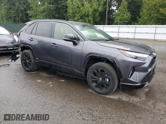 2023 Toyota RAV4 Hybrid XSE with VIN JTME6RFV5PJ037206, listed as a Copart auction lot 61597265 with 5,094 mi miles and Salvage title. Bid and sale history available at DreamBid. Image 4.