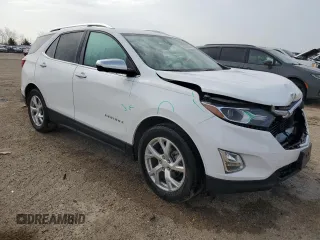 2021 Chevrolet Equinox Premier с VIN 3GNAXNEV1MS109834, выставлен на аукционе Copart как лот 54452205 с пробегом 37 438 миль миль и Списание • Salvage title. История ставок и продаж доступна на DreamBid. Изображение 4.