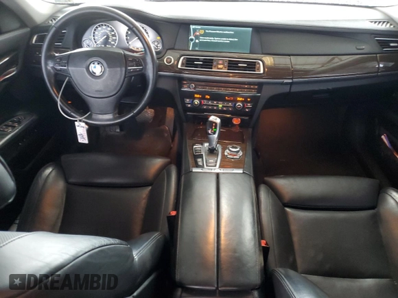 2011 BMW 7 Series 750i xDrive with VIN WBAKC6C56BC394810, listed as a Copart auction lot 79025014 with 152,399 mi miles and Salvage title. Bid and sale history available at DreamBid. Image 8.
