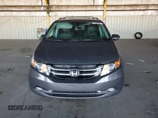 2014 Honda Odyssey Touring with VIN 5FNRL5H99EB111525, listed as a Copart auction lot 61986005 with 137,905 mi miles and Salvage title. Bid and sale history available at DreamBid. Image 5.