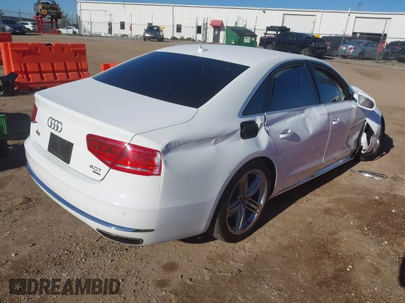 2013 Audi A8 4.0L with VIN WAUA2AFD9DN017867, listed as a IAAI auction lot 40430651 with 114,928 mi miles and . Bid and sale history available at DreamBid. Image 4.