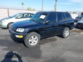 1999 Toyota RAV4 with VIN JT3GP10V9X7058125, listed as a IAAI auction lot 42056633 with 247,015 mi miles and . Bid and sale history available at DreamBid. Image 2.