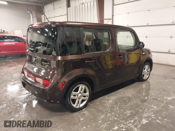 2009 Nissan Cube S z VIN JN8AZ28R39T124465, wystawiony jako IAAI lot #40769739 z przebiegiem 145 993 mil mil oraz . Historia ofert i sprzedaży dostępna na DreamBid. Obrazek 4.