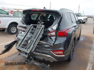 2020 Hyundai Santa Fe Limited with VIN 5NMS53AA8LH213608, listed as a IAAI auction lot 41787079 with 53,634 mi miles and . Bid and sale history available at DreamBid. Image 6.