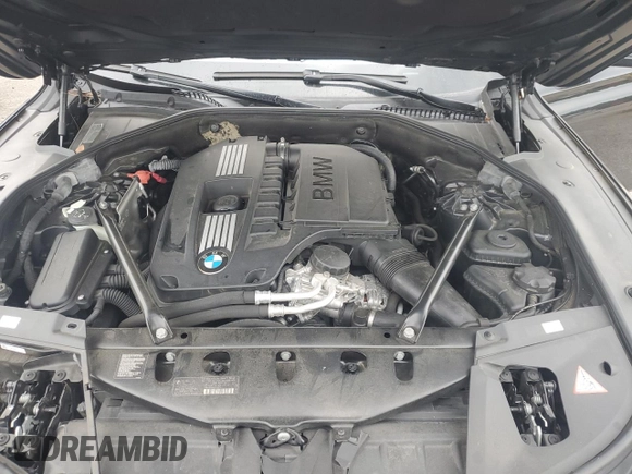 2012 BMW 7 Series 740Li with VIN WBAKB4C59CC576476, listed as a Copart auction lot 55670215 with 100,907 mi miles and Salvage title. Bid and sale history available at DreamBid. Image 11.
