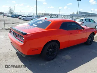 2016 Dodge Challenger SXT Plus z VIN 2C3CDZAG7GH353301, wystawiony jako IAAI lot #41780008 z przebiegiem 103 627 mil mil oraz . Historia ofert i sprzedaży dostępna na DreamBid. Obrazek 4.