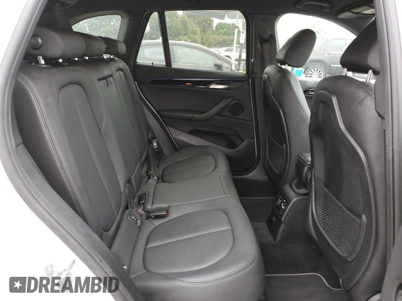 2021 BMW X1 xDrive28i with VIN WBXJG9C09M5U35093, listed as a Copart auction lot 65509155 with 46,875 mi miles and Salvage title. Bid and sale history available at DreamBid. Image 11.