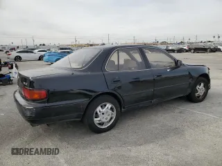 1995 Toyota Camry LE with VIN JT2GK12E2S0079545, listed as a Copart auction lot 84058164 with 150,539 mi miles and Salvage Title. Bid and sale history available at carsss.com. Image 3.