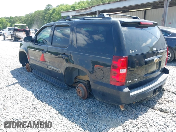 2007 Chevrolet Tahoe LS with VIN 1GNFC13067R419714, listed as a IAAI auction lot 42276294 with Not provided miles and . Bid and sale history available at DreamBid. Image 3.