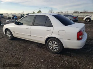 2001 Mazda Protege DX with VIN JM1BJ222410441812, listed as a Copart auction lot 88330565 with 169,447 mi miles and Salvage Title. Bid and sale history available at carsss.com. Image 2.