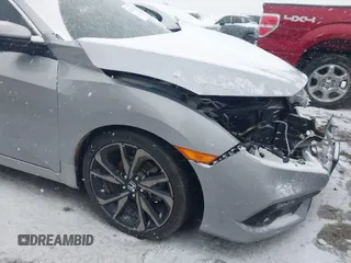 2019 Honda Civic Sport with VIN 2HGFC2F85KH605786, listed as a IAAI auction lot 41621480 with 66,438 mi miles and . Bid and sale history available at DreamBid. Image 21.