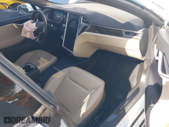 2016 Tesla Model S 90D with VIN 5YJSA1E27GF153525, listed as a IAAI auction lot 41539221 with 145,771 mi miles and . Bid and sale history available at DreamBid. Image 5.