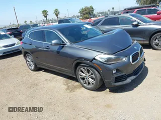 2018 BMW X2 sDrive28i with VIN WBXYJ3C33JEJ84137, listed as a IAAI auction lot 42543859 with 68,629 mi miles and . Bid and sale history available at DreamBid. Image 1.